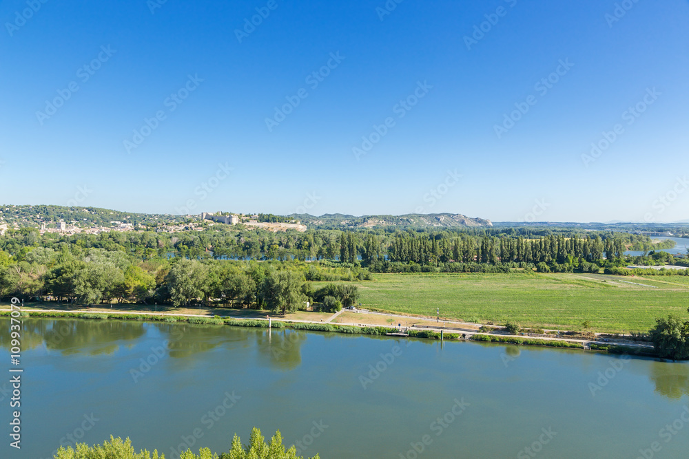 Avignon, France. The island on the Rhone River. In the background the city of Villeneuve-lès-Avignon and Fort Saint-Andre