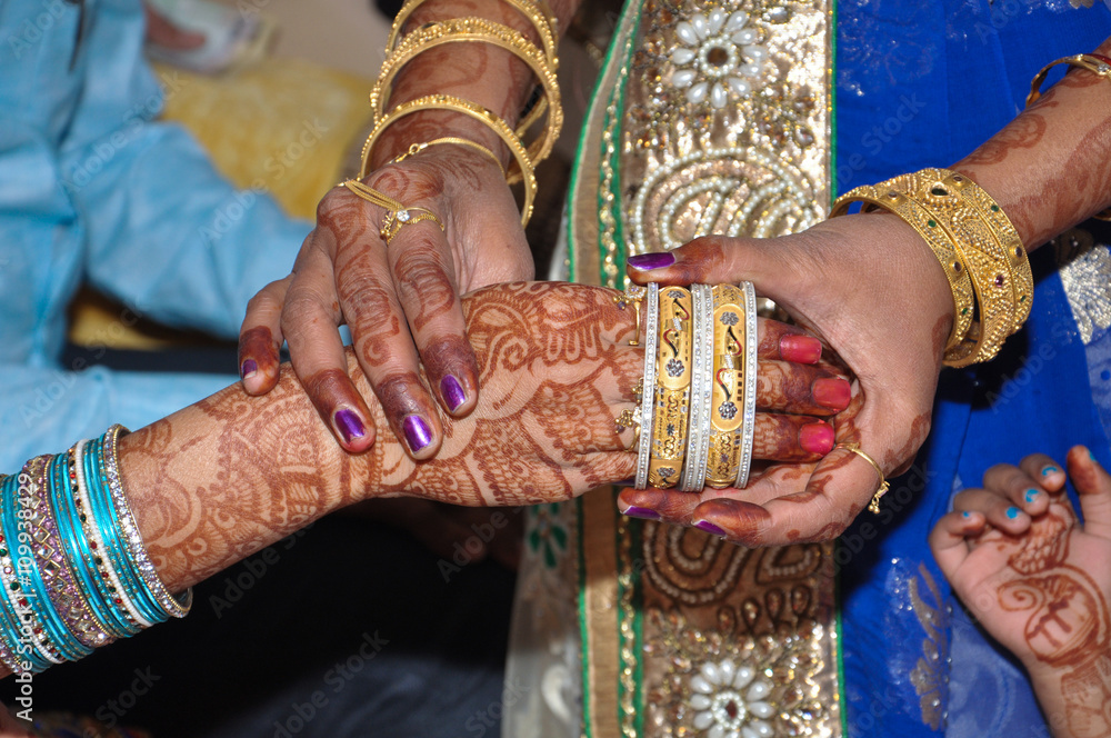 Indian Bride Wering A Gold Hand Ring 