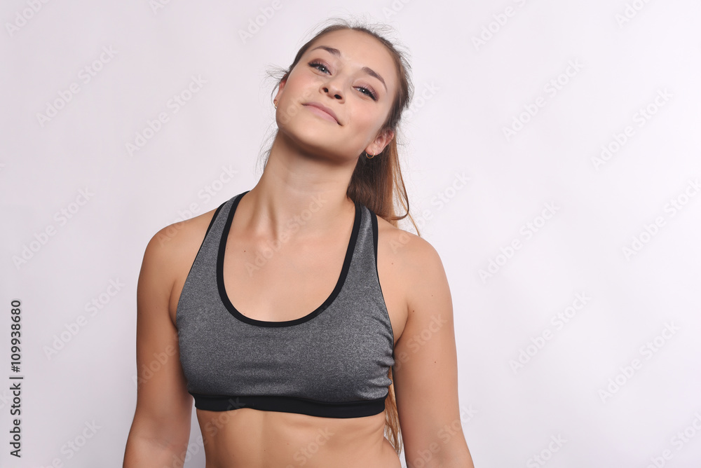 Portrait of beautiful and athlete young woman. Portrait of beautiful and athlete young woman.