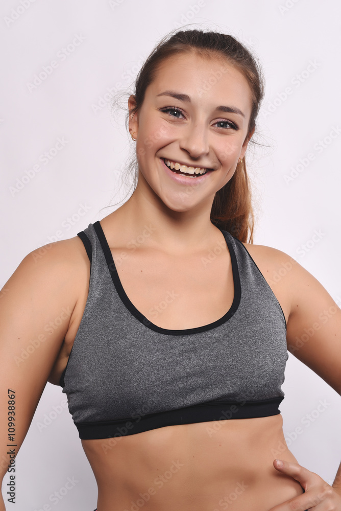 Portrait of beautiful and athlete young woman. Portrait of beautiful and athlete young woman.