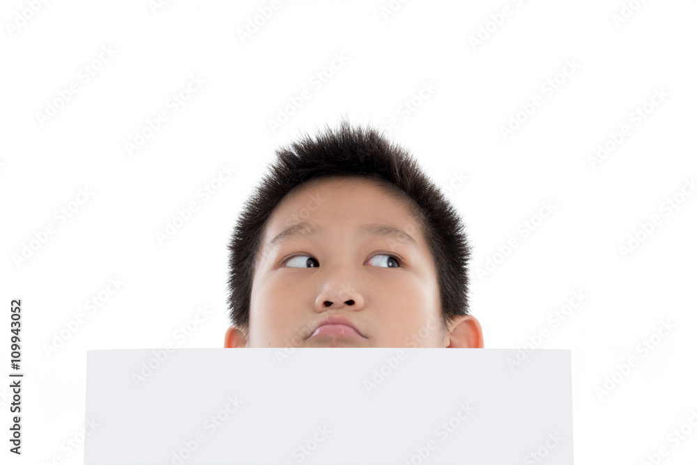 Asian boy holding white board and looking up, isolated on white Asian boy holding white board and looking up, isolated on white