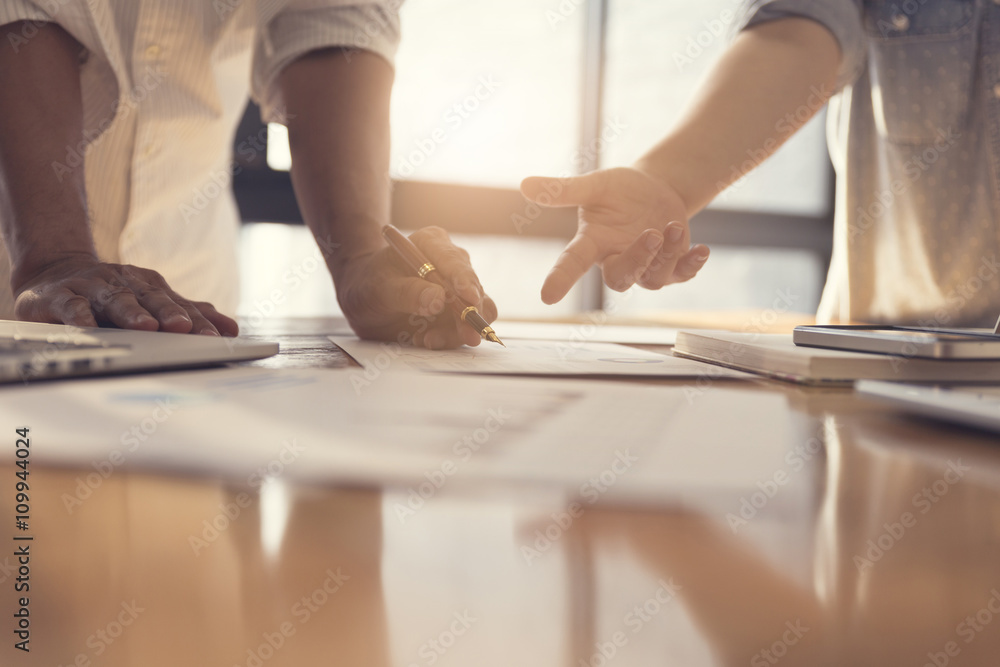 people working with document together people working with document together