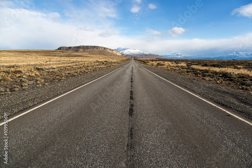 Empty road in El Calafate with a snow mountain, Patagonia Argentina