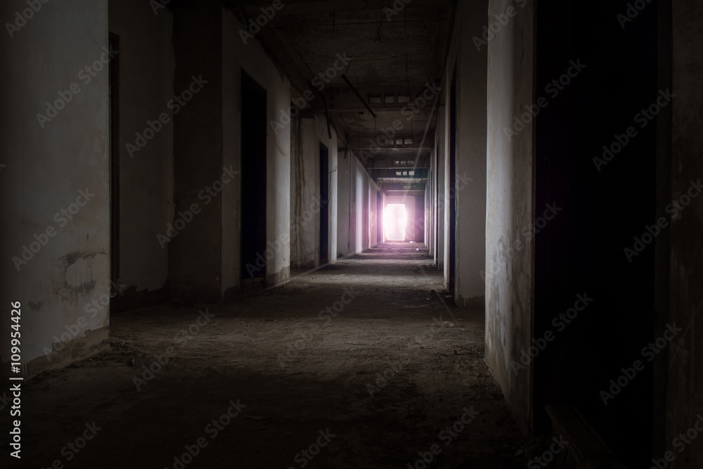 Abandoned building / View of inside the abandoned building, Halloween background. Dark tone with violet light. Abandoned building / View of inside the abandoned building, Halloween background. Dark tone with violet light.