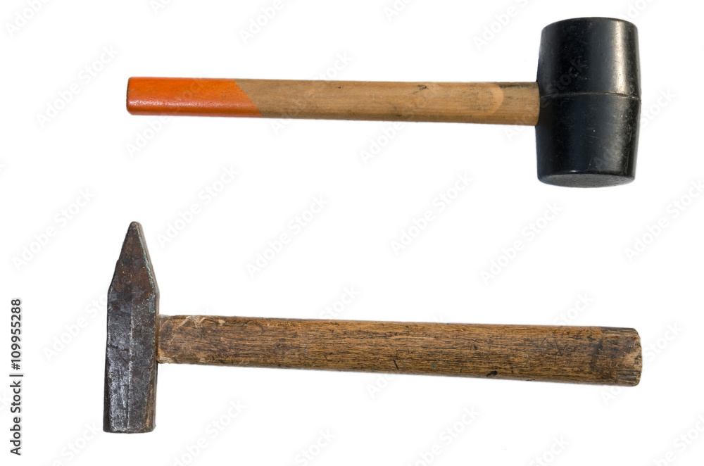 Rubber and steel hammer on a white background. Rubber and steel hammer on a white background.