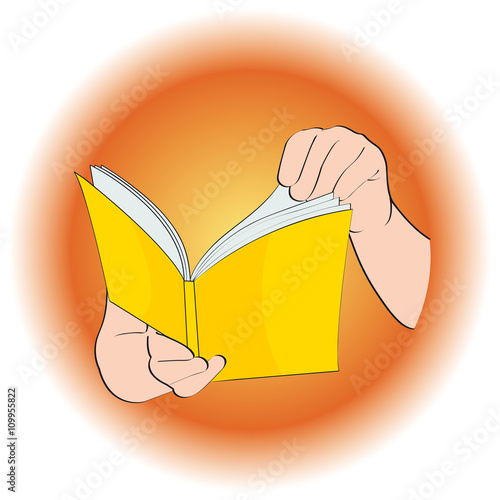 Manos con un libro al sol