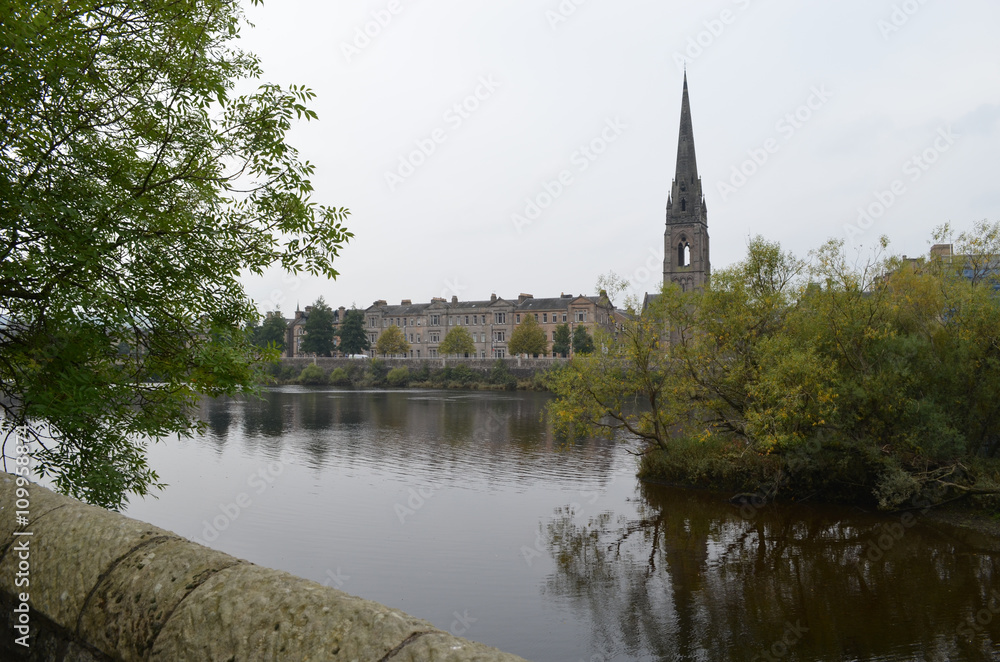 View from the shore of river Tay on the city of Perth, Scotland, on a gray autumn day