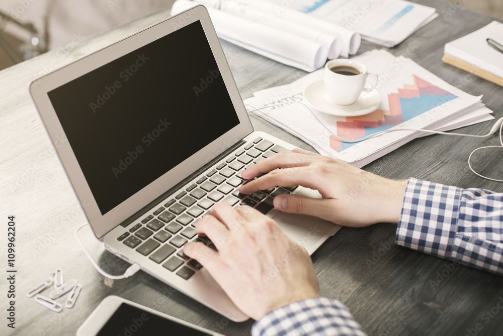 Man typing with two hands Man typing with two hands
