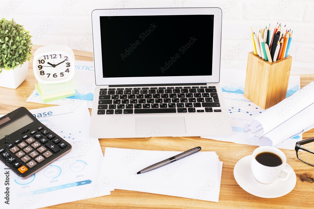 Black laptop and tools front Black laptop and tools front