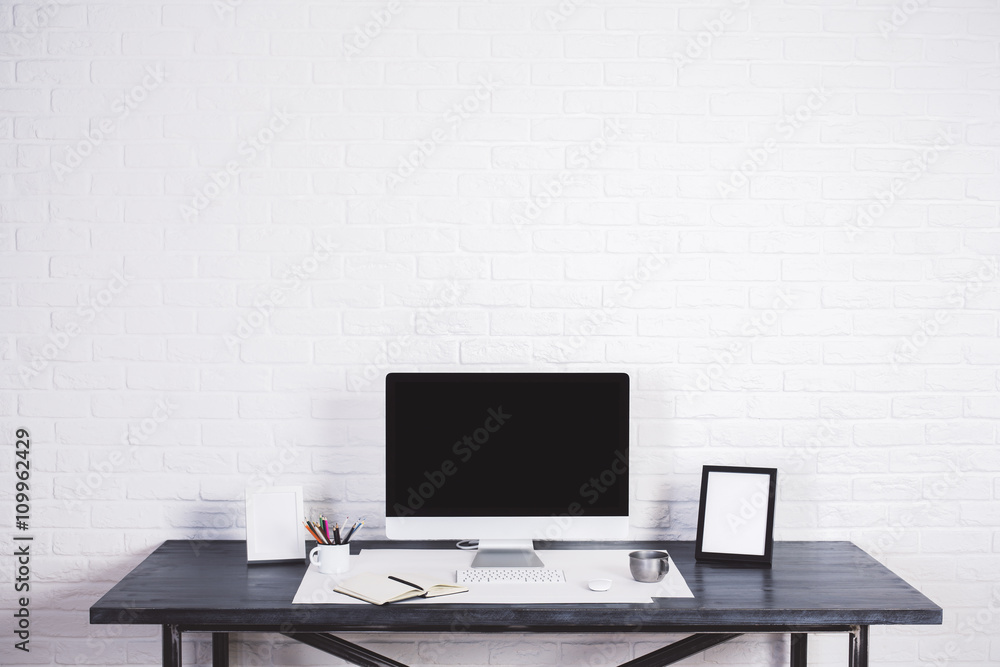 Designer desk with items