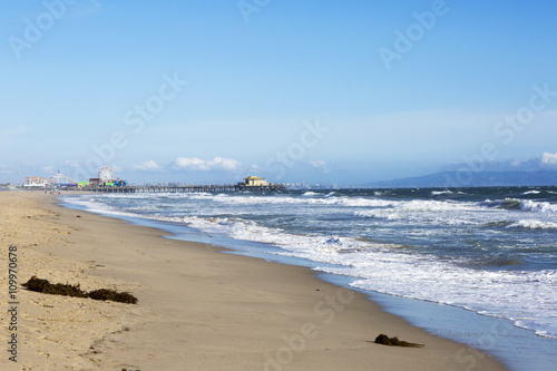 The Pacific ocean and a clear day, Santa Monica. Beach landscape in the USA with blue sea and mountain ranges. 