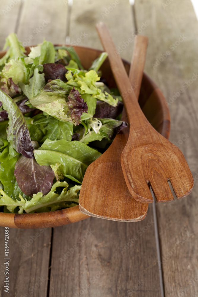 vegetable salad in wooden bowl vegetable salad in wooden bowl