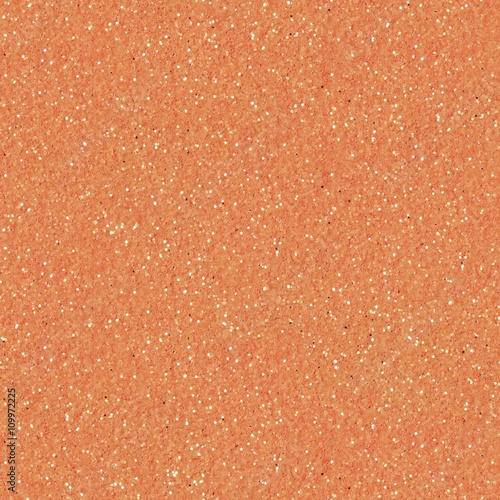 Orange glitter texture christmas background. Low contrast photo. Seamless square texture. Tile ready.