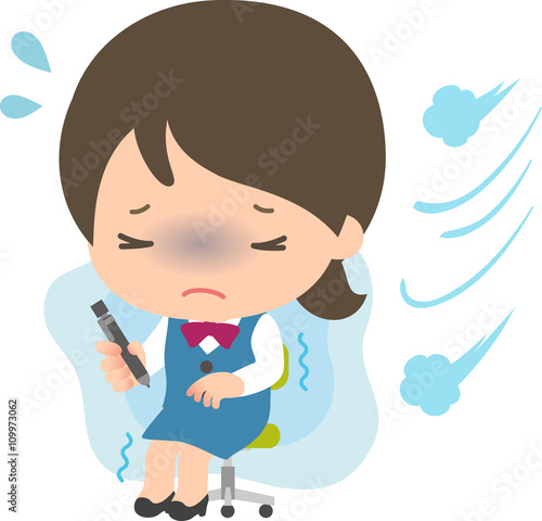 オフィスの冷房が寒くて困っている女性