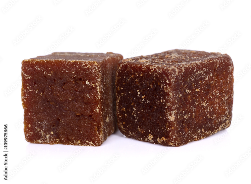 coconut flower sugar blocks on white background. coconut flower sugar blocks on white background.