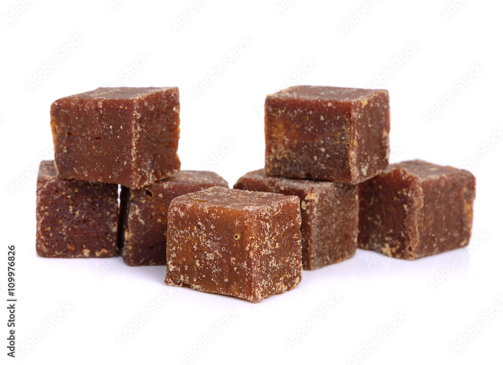 coconut flower sugar blocks on white background. coconut flower sugar blocks on white background.