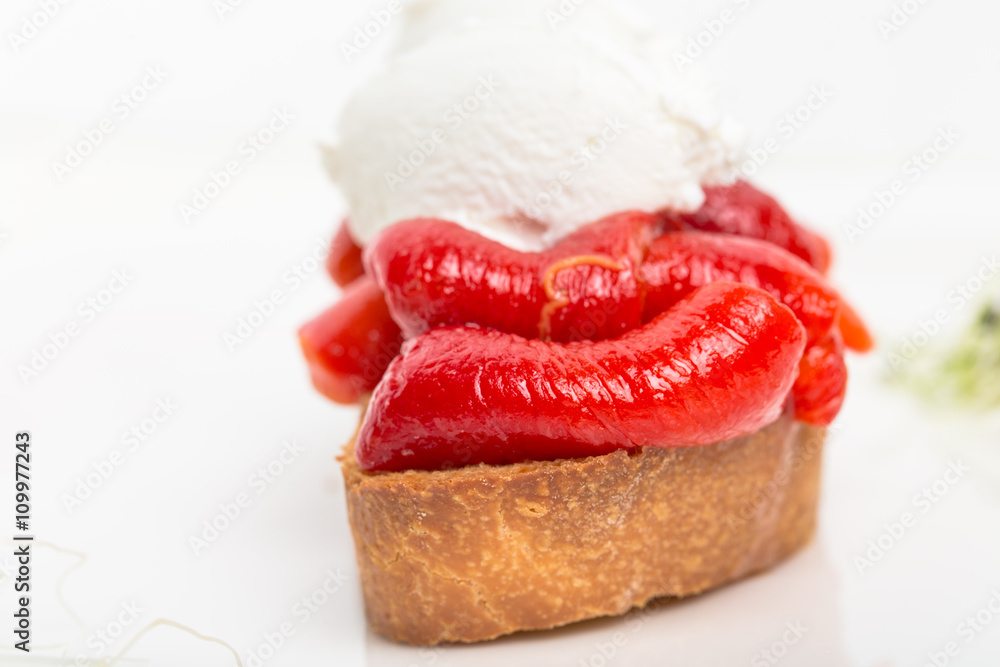 Bruschetta with stewed peppers and mascarpone cheese. Bruschetta with stewed peppers and mascarpone cheese.