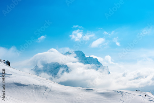 beautiful winter landscape of Dombaj with blue sky, clouds and d photo