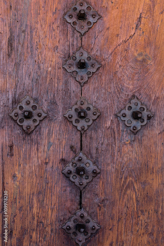 Old doorknob or knocker that serve as decoration on the doors of houses.