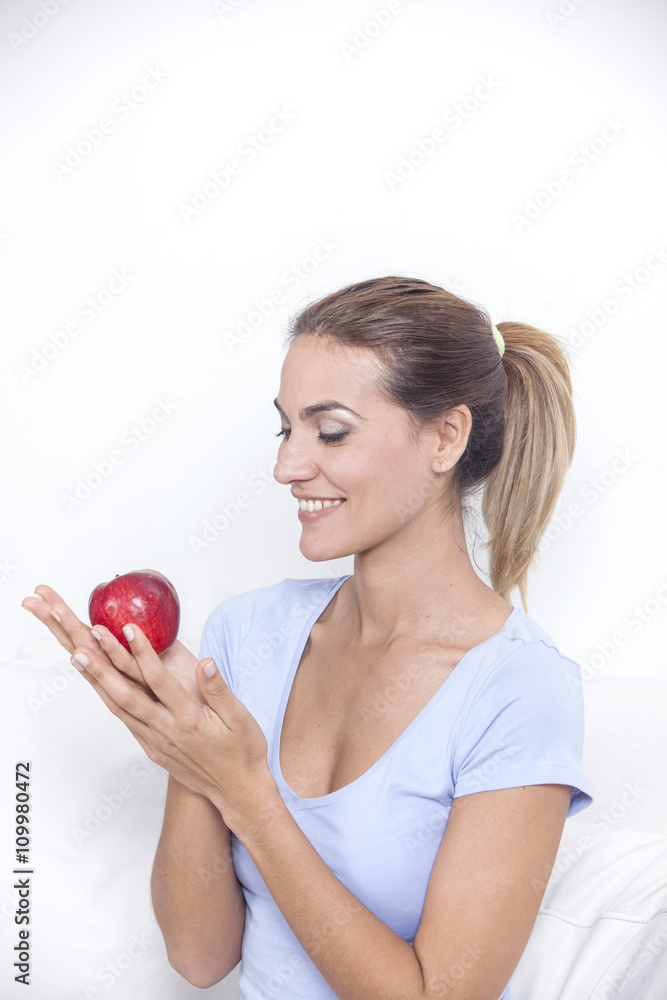 Beautiful woman with red apple in hand Beautiful woman with red apple in hand