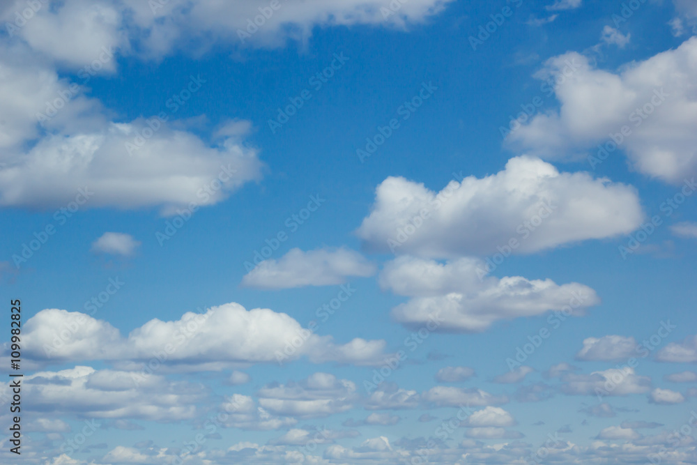 Blue sky background with soft silky clouds. Blue sky background with soft silky clouds.