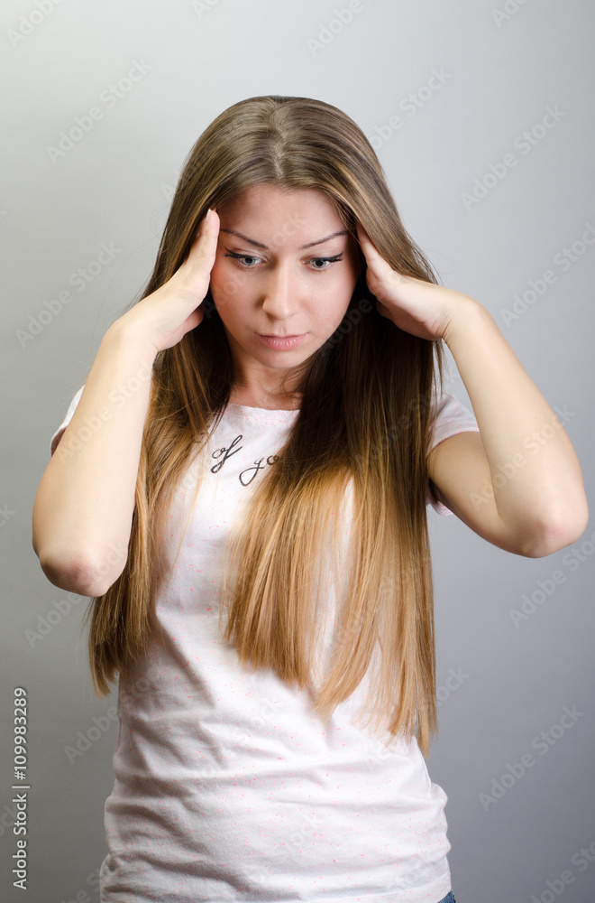 Portrait of a beautiful young woman thinking Portrait of a beautiful young woman thinking