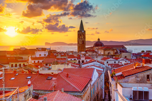 A sunset over Alghero city, Sardinia photo