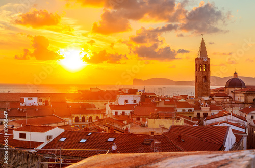 A sunset over Alghero city, Sardinia photo