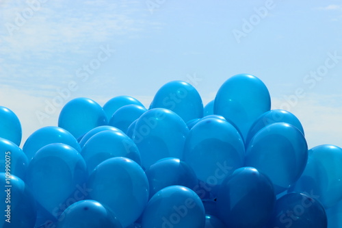 blue balloons on the sky background
