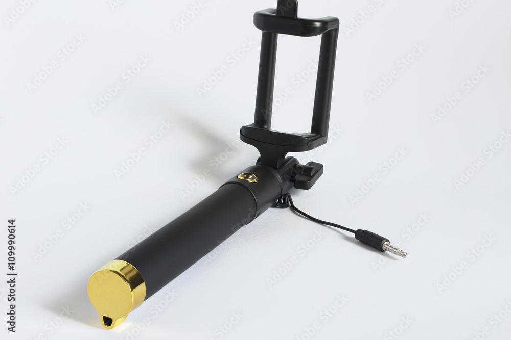 Wired selfie stick on a white background Wired selfie stick on a white background