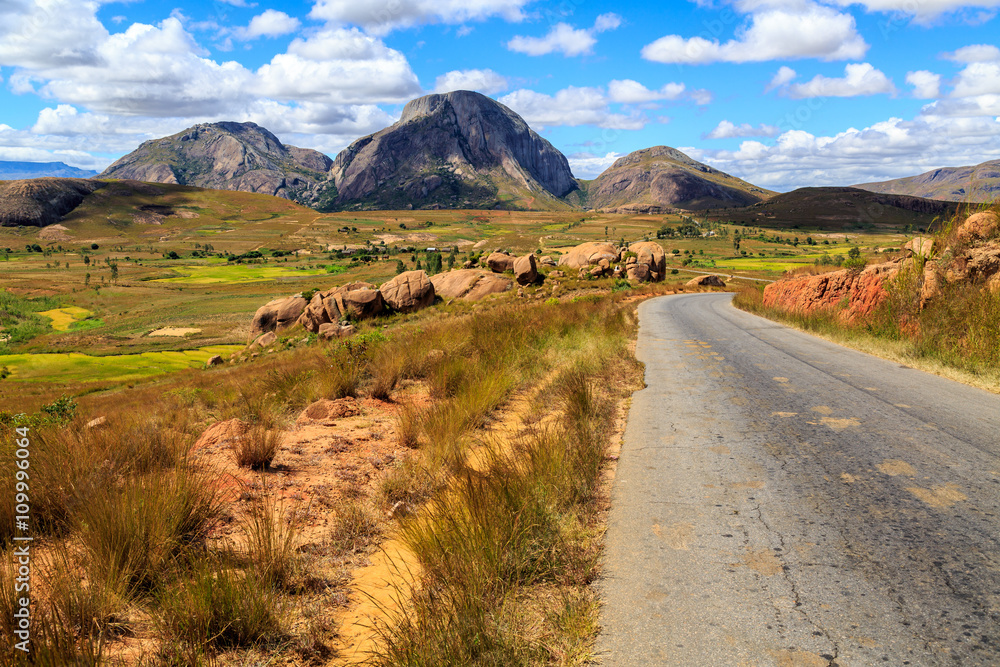 Landscape with road and rock formation in central Madagascar