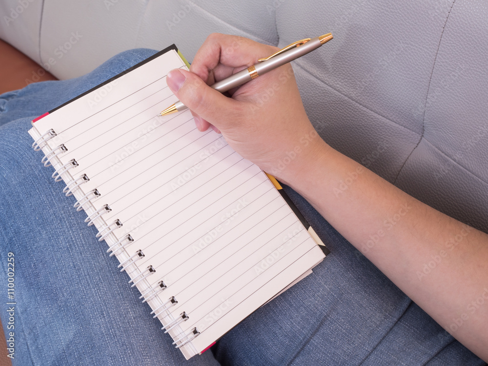Writing on notebook 1 Writing on notebook 1