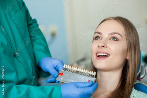 Dentist examining a patient's teeth