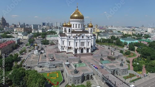Unique aerial view of Cathedral of Christ the Savior in Moscow city. Russia. Helicopter approach and close flight near. Sunny day.