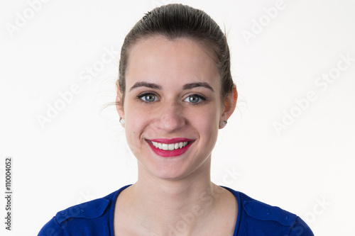 Happy and young woman with a blue top