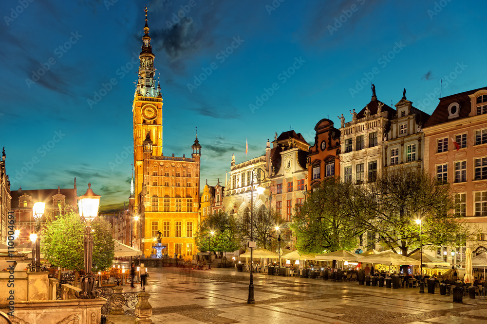 Street scene with renaissance building of the former Town Hall in Gdansk, Poland.
