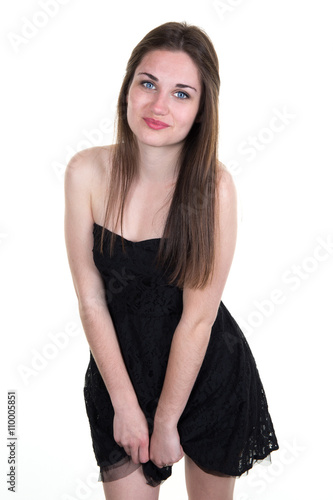 Cheerful young brunette with blue eyes and black dress © OceanProd