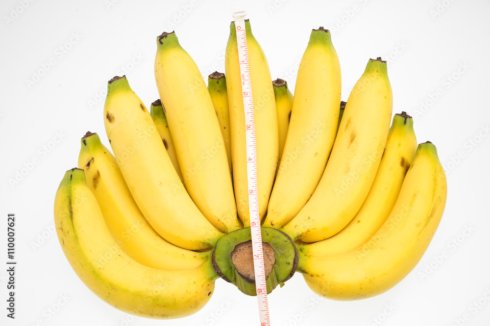  banana  with measure tape on white background