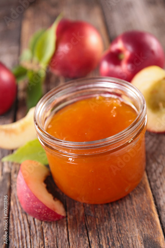 peach jam in a glass jar