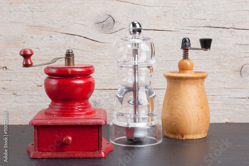 Three pepper mills