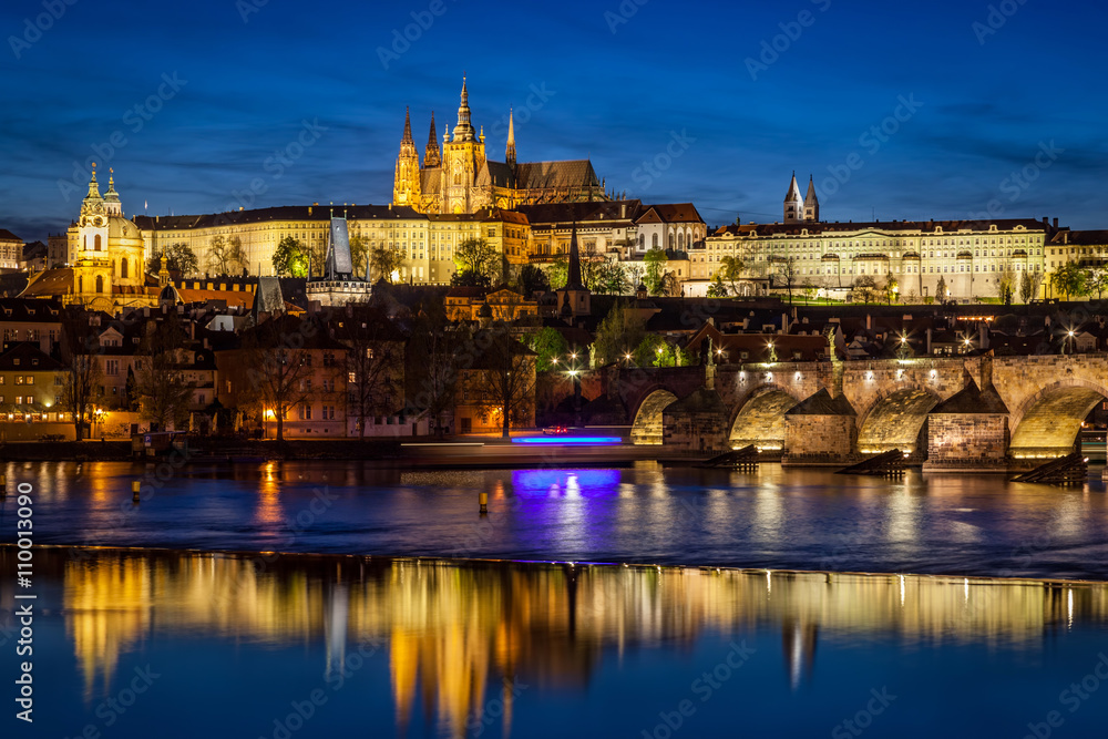 Prague Castle, Hradcany reflecting in Vltava river in Prague, Czech Republic at night