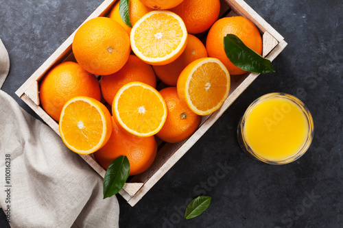 Fresh orange fruits and juice