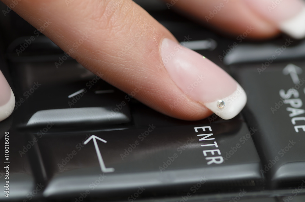 Finger on Enter Button Finger on Enter Button