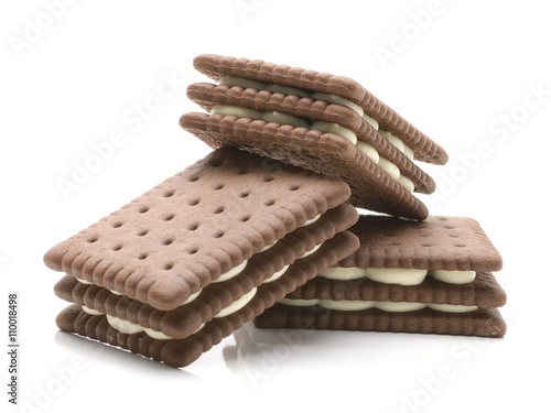 sandwich biscuits with white cream on white background
