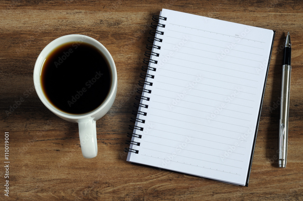 Smart phone, coffee, pen and notepad with text Smart phone, coffee, pen and notepad with text