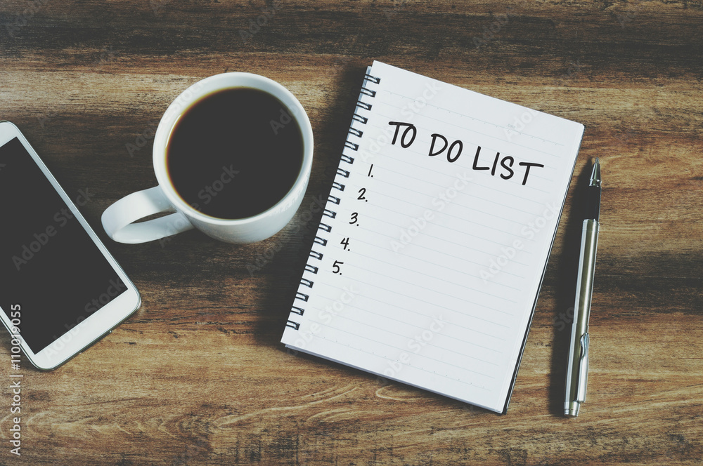 Smart phone, coffee, pen and notepad with text Smart phone, coffee, pen and notepad with text