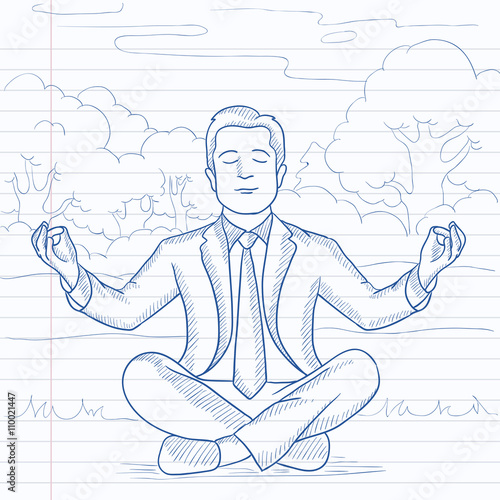 Businessman meditating in lotus pose.