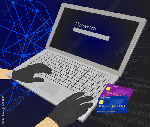 Hacker trying to enter the password with credit cards next to his laptop using them for unauthorized shopping