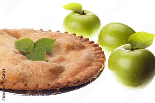 close-up image of apple pie with green apples.