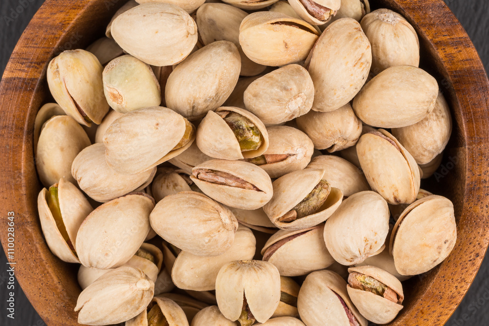 Pistachio nuts in bowl Pistachio nuts in bowl